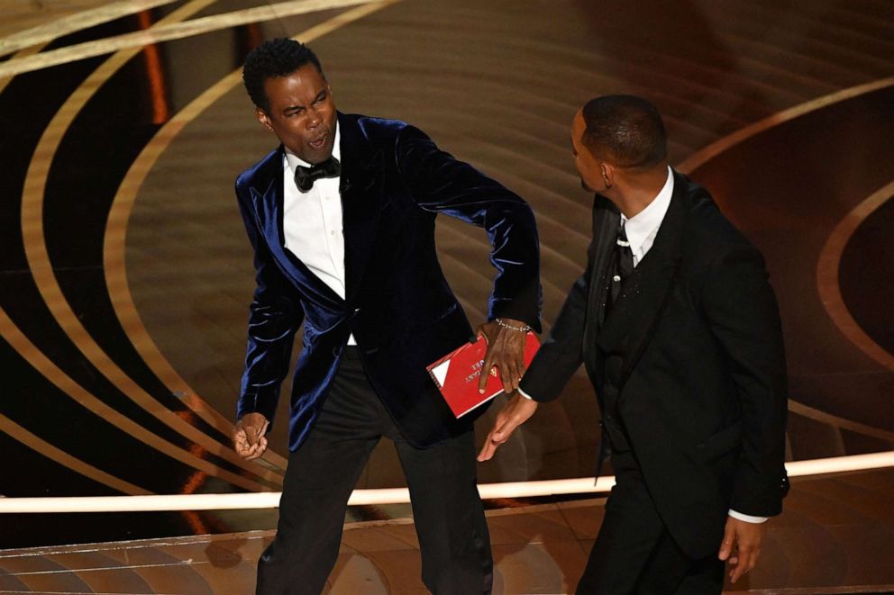 Photo: Will Smith, right, slaps Chris Rock on stage after Rock made a joke about Smith's wife Jada Pinkett Smith during the 94th Academy Awards at the Dolby Theater in Hollywood, California, March 27, 2022. 