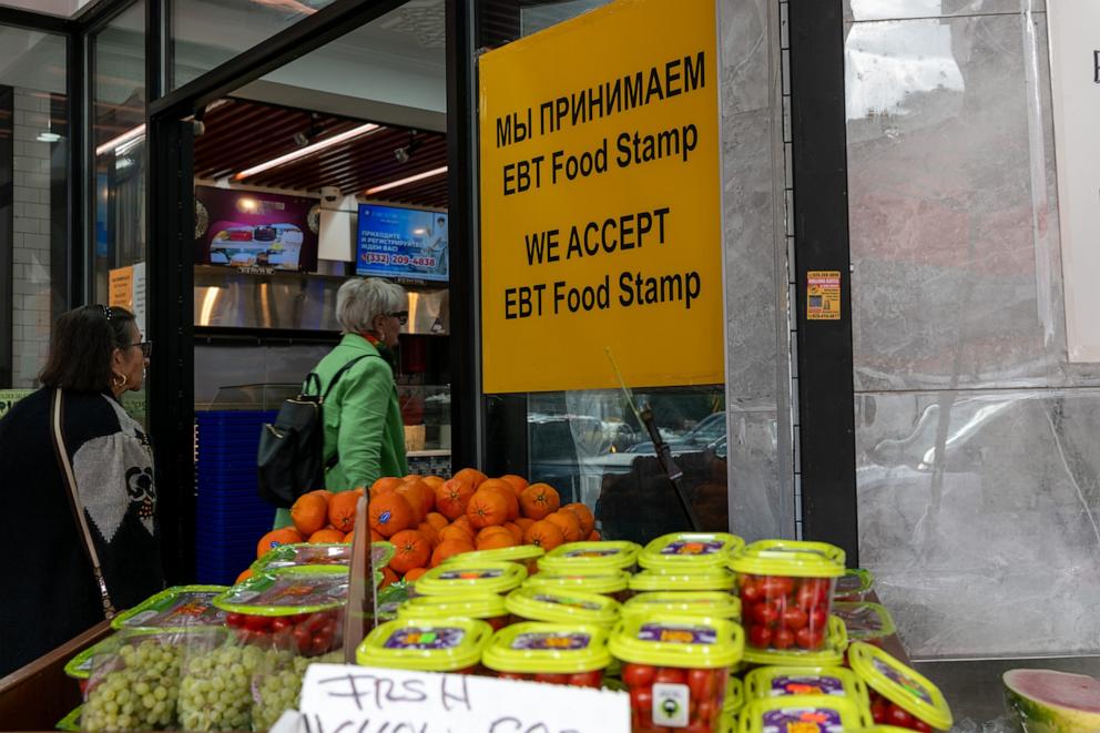 PHOTO: People shop for food in a Brooklyn neighborhood, Oct. 16, 2023, in New York.