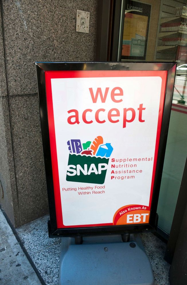 PHOTO: In this Oct. 20, 2012, file photo, a sign in front of a 7-Eleven in New York announces that the convenience store accept SNAP (Supplemental Nutrition Assistance Program), also known as EBT.