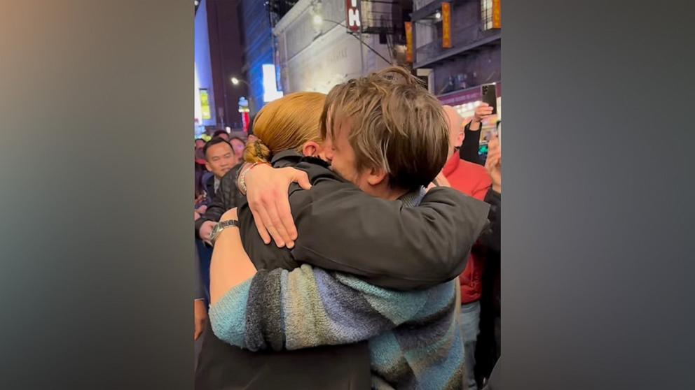 PHOTO: Sarah Snook embraces Kieran Culkin.