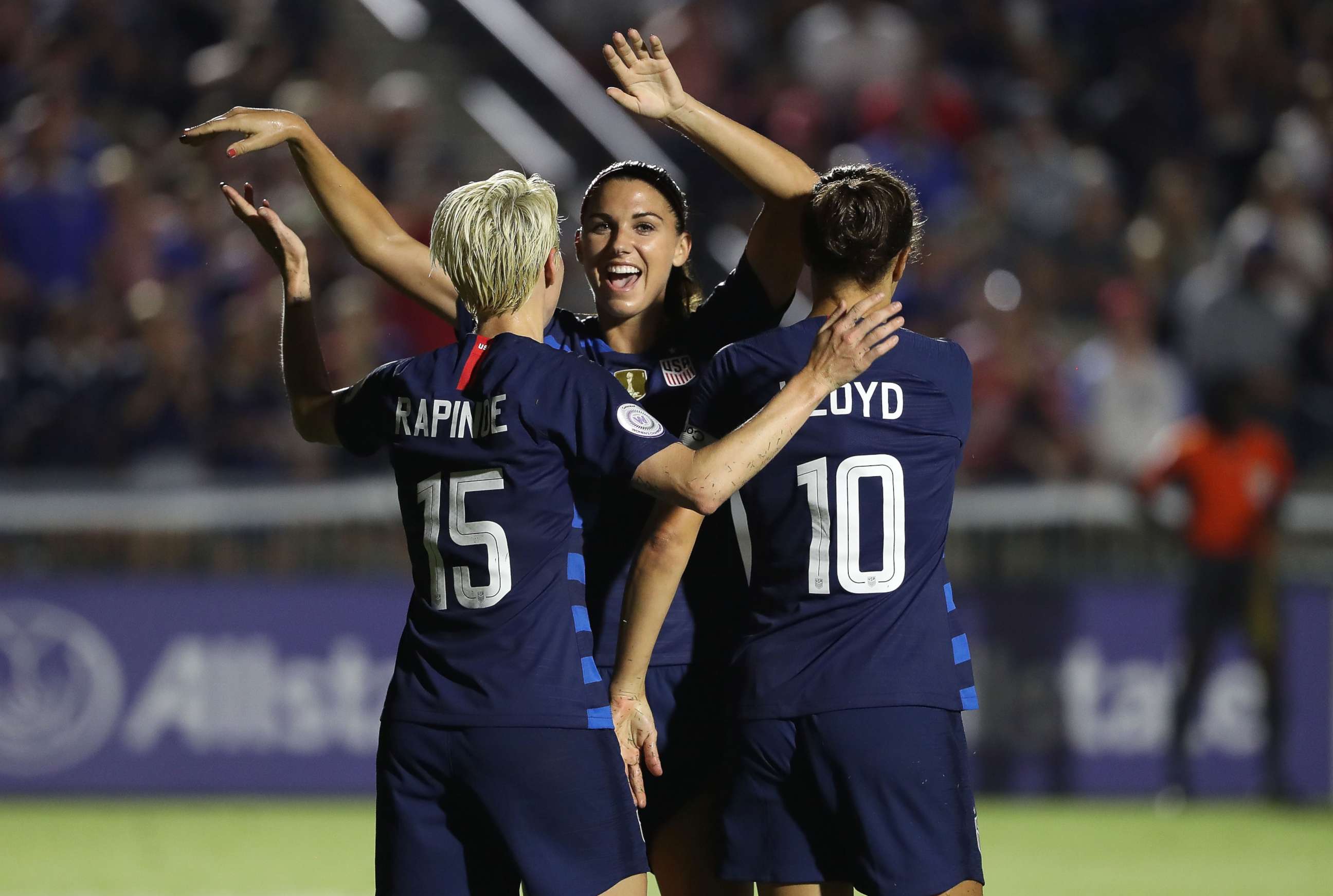 PHOTO: Megan Rapinoe reacts after scoring a goal as she celebrates with teammates Alex Morgan and Carli Lloyd of USA against Mexico, Oct. 4, 2018 in Cary, N.C.