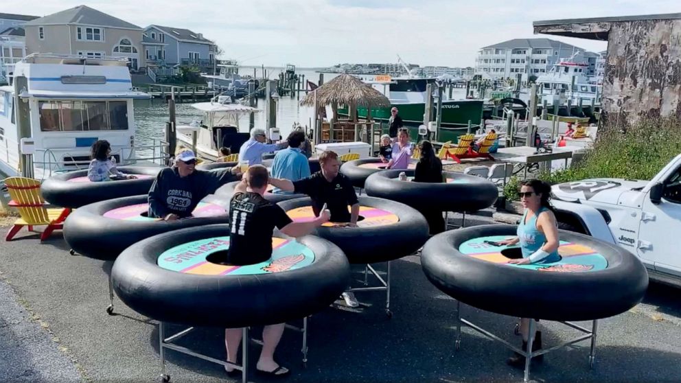 PHOTO: A video provided by Revolution Event Design & Production, "bumper tables,"  are debuted at Fish Tales, a restaurant in Ocean City, Md, May 16, 2020.