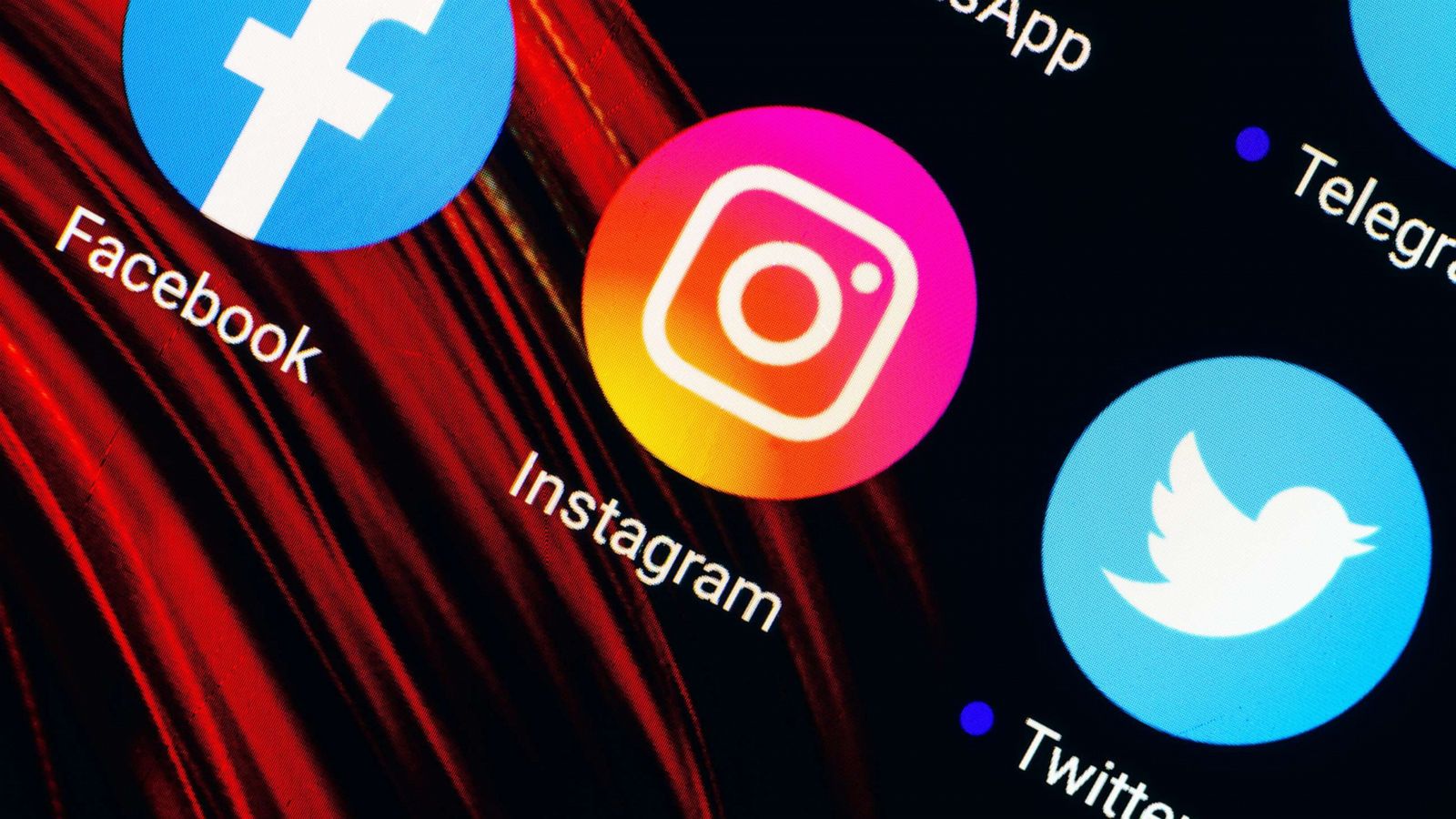 PHOTO: In this photo illustration the Facebook, Instagram and Twitter app icons are seen displayed on a smartphone screen.