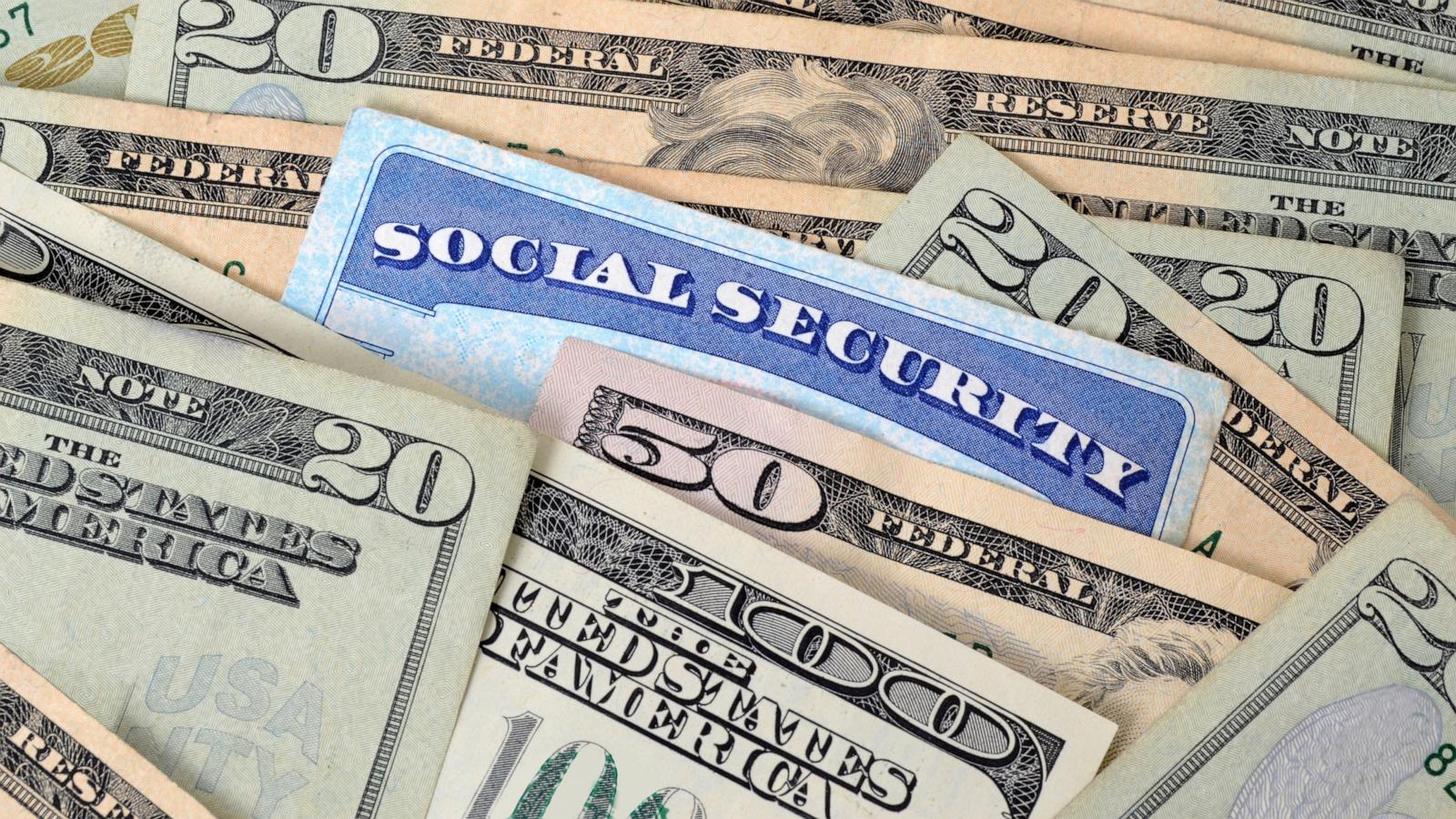 PHOTO: a social security card and money