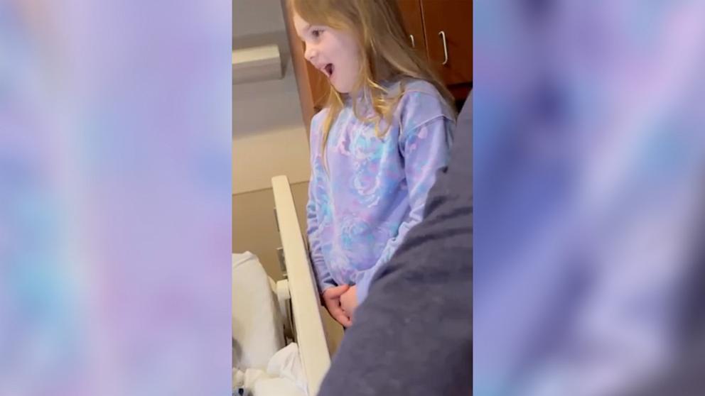 PHOTO: Sophia, 7, was captured reacting after seeing her younger sister being born. Sophia’s mom, Ashley Cunningham, shared her reaction in a now-viral TikTok video.