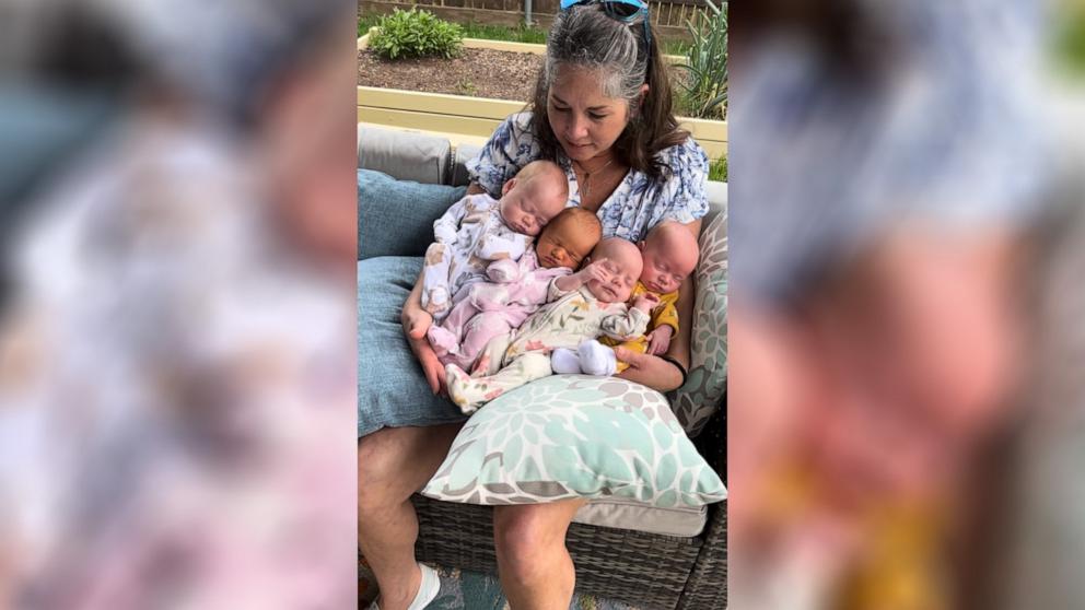 VIDEO: Internet is in awe as grandmother holds 4 newborn grandbabies