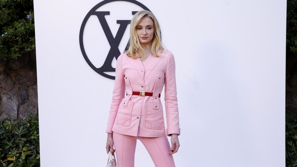 PHOTO: In this May 23, 2024, file photo, actress Sophie Turner poses at the photocall of the Louis Vuitton fashion show at Park Guell, in Barcelona, Catalonia, Spain. 