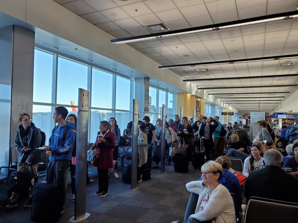 PHOTO: People line up based on boarding group numbers to board a Southwest Airlines flight at Oakland International Airport (OAK), Jan. 5, 2020, in Oakland, Calif.