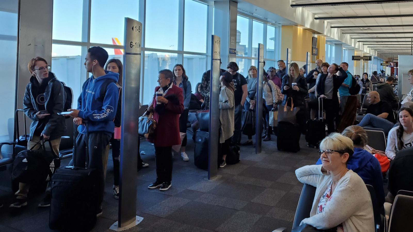 PHOTO: People line up based on boarding group numbers to board a Southwest Airlines flight at Oakland International Airport (OAK), Jan. 5, 2020, in Oakland, Calif.