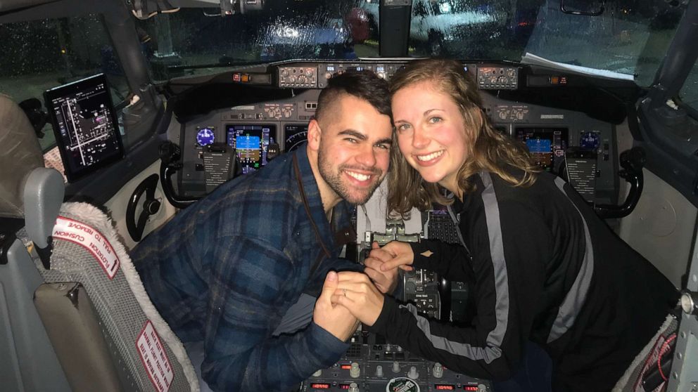 PHOTO: Nick Boucher and Emily Weindorf celebrated their proposal in the cockpit.