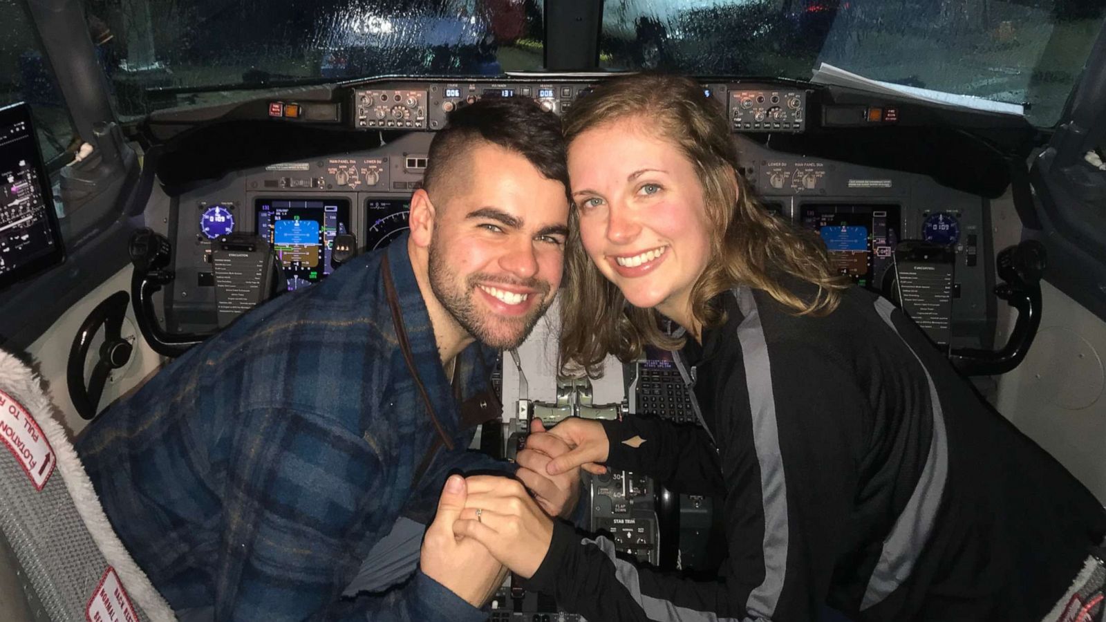 PHOTO: Nick Boucher and Emily Weindorf celebrated their proposal in the cockpit.