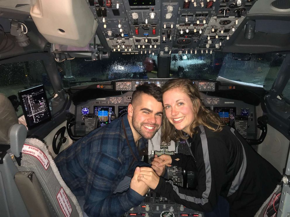 PHOTO: Nick Boucher and Emily Weindorf celebrated their proposal in the cockpit.
