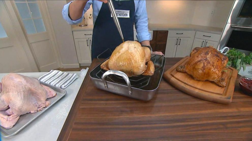 PHOTO: Dan Souza demonstrates why basting is not necessary for cooking turkeys.