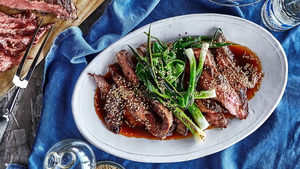 PHOTO: Soy sauce–marinated grilled flank steak and scallions from Bon Appétit.