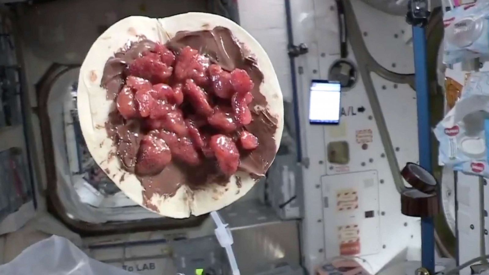 PHOTO: In this still taken from a video, a crepe made by Thomas Pesquet, first French commander of the International Space Station, floats in micro-gravity on the International Space Station.