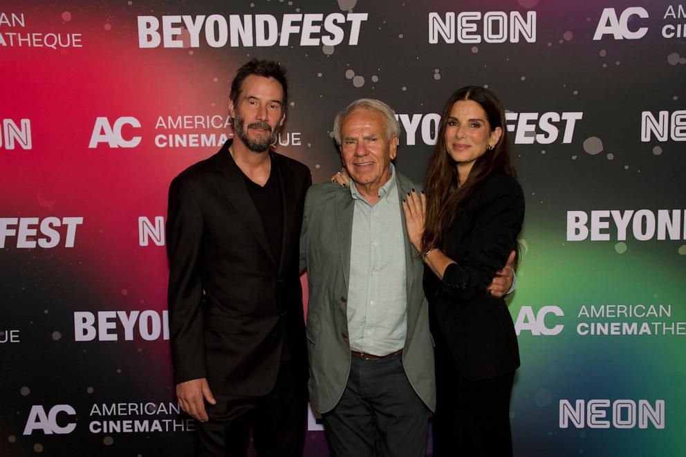 PHOTO: Keanu Reeves, Jan de Bont and Sandra Bullock attend Beyond Fest at American Cinematheque 30th Anniversary Screening of "SPEED," Oct. 8, 2024. 