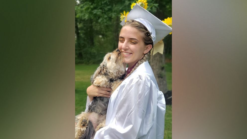 PHOTO: Alexis Spence, now 19, is pictured in her high school graduation gown.