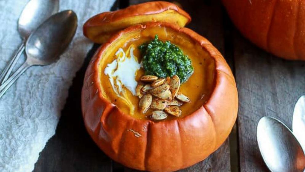 PHOTO: Roasted garlic sage pesto pumpkin soup with spicy fried pumpkin seeds.