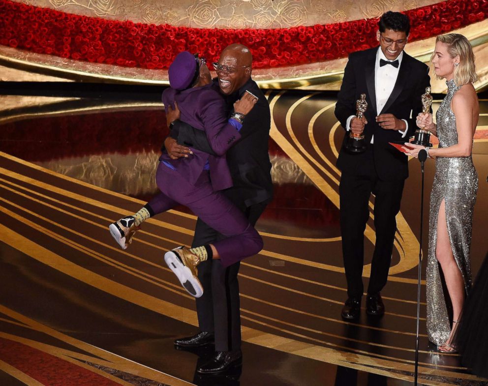 PHOTO: Spike Lee jumps into the arms of Samuel L. Jackson as he accepts the award for best original screenplay during the 91st Annual Academy Awards at the Dolby Theatre in Hollywood, Calif., Feb. 24, 2019.
