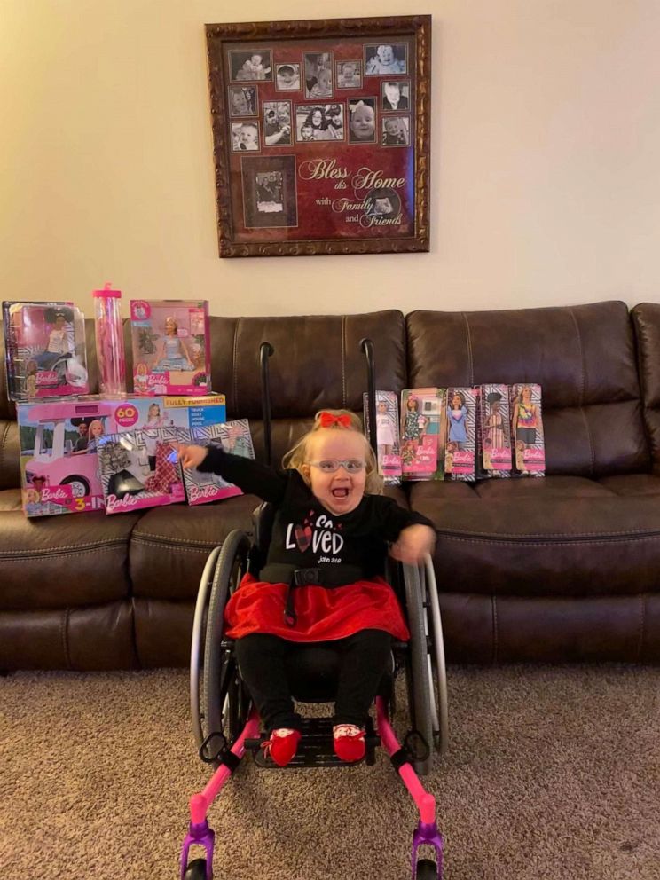 PHOTO: Ella Rogers was born with spina bifida and uses a wheelchair. When her mom and dad gifted her a Barbie who also uses a wheelchair, the doll became her new favorite toy.
