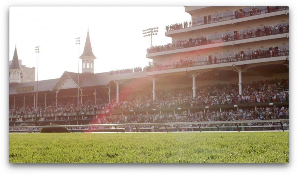 PHOTO: The stands at Churchill Downs from the infield facing the spires.