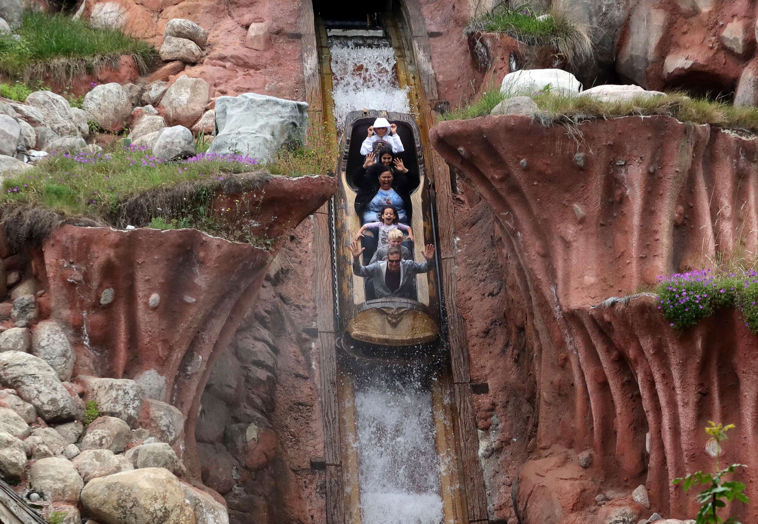 PHOTO: In this April 13, 2023, file photo, people ride the Splash Mountain attraction at the Disneyland theme park in Anaheim, Calif.