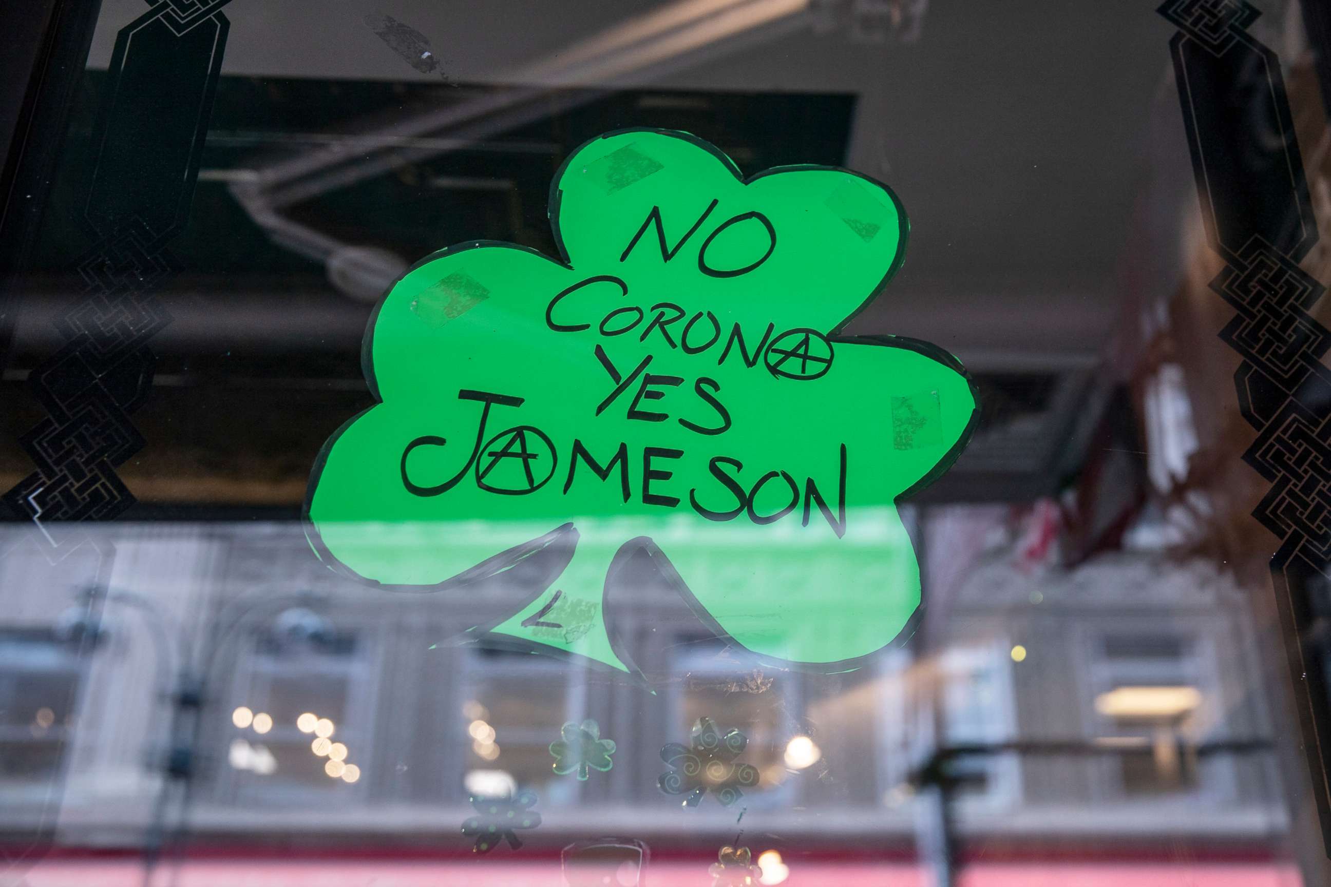 PHOTO: A St. Patrick's Day decoration celebrating Jameson Irish Whiskey hangs in the window of a bar closed on March 17, 2020 in New York City. 