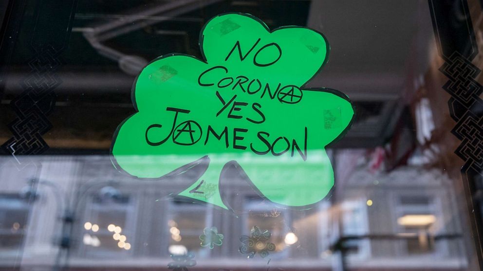 PHOTO: A St. Patrick's Day decoration celebrating Jameson Irish Whiskey hangs in the window of a bar closed on March 17, 2020 in New York City. 