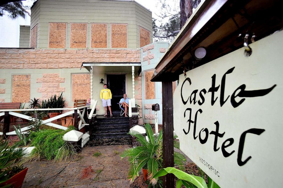 PHOTO: People stay at Castle Hotel at the bay of St. Pete Beach, as the winds from Hurricane Ian arrive on Sept. 28, 2022 in St. Petersburg, Fla.