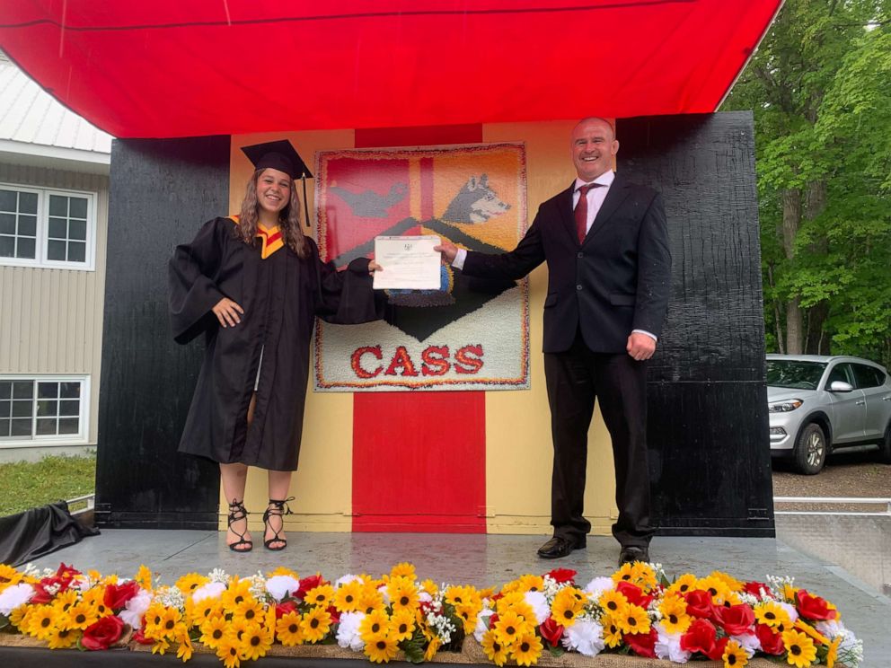 PHOTO: Alyssa Glover with their diploma and Ray Gowlett on the weekend of June 26.