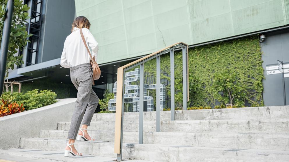 PHOTO: A woman walks up the stairs in a undated stock photo.