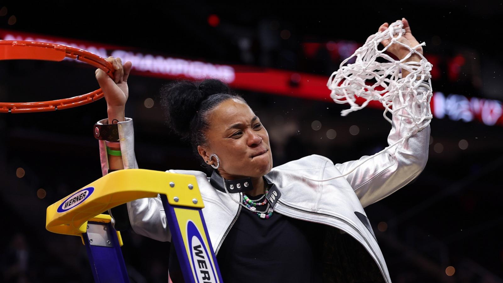PHOTO: Head coach Dawn Staley of the South Carolina Gamecocks cuts down the net after beating the Iowa Hawkeyes in the 2024 NCAA Women's Basketball Tournament National Championship at Rocket Mortgage FieldHouse on April 7, 2024 in Cleveland.