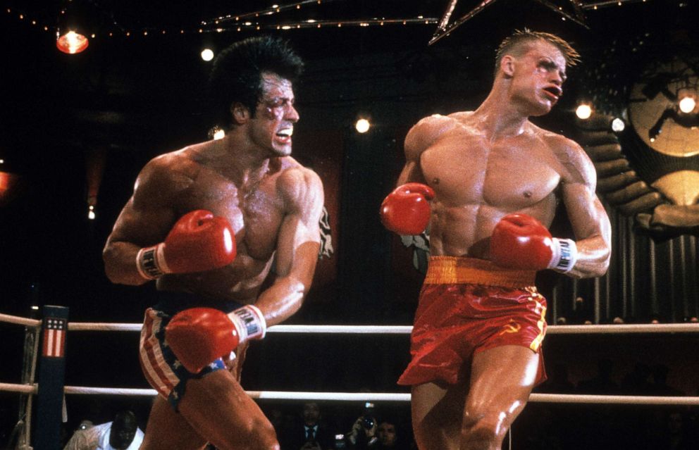 PHOTO: Sylvester Stallone punches Dolph Lundgren in a scene from the film 'Rocky IV', 1985.
