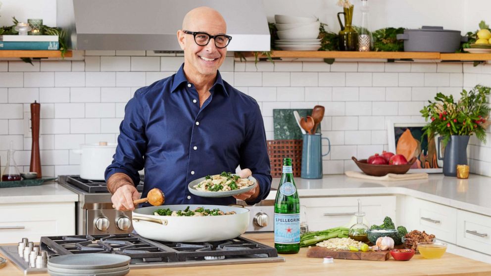 PHOTO: Stanley Tucci cooking his new at-home pasta kit with S.Pellegrino.