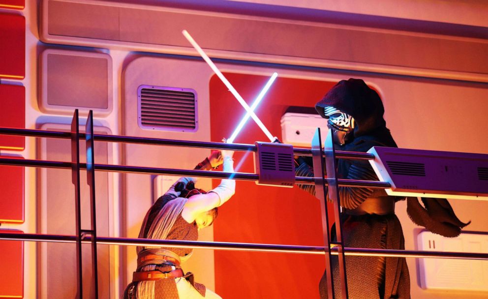 PHOTO: Rey battles Kylo Ren as part of the media preview of the Star Wars Galactic Starcruiser Experience at Walt Disney World on Feb. 22, 2022.