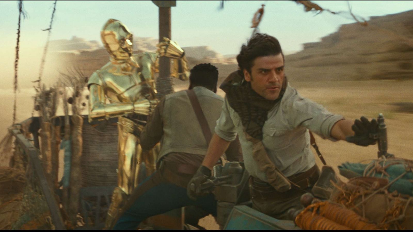 PHOTO: C3PO, John Boyega and Oscar Isaac appear in a scene from the 2019 film, "Star Wars: The Rise of Skywalker."