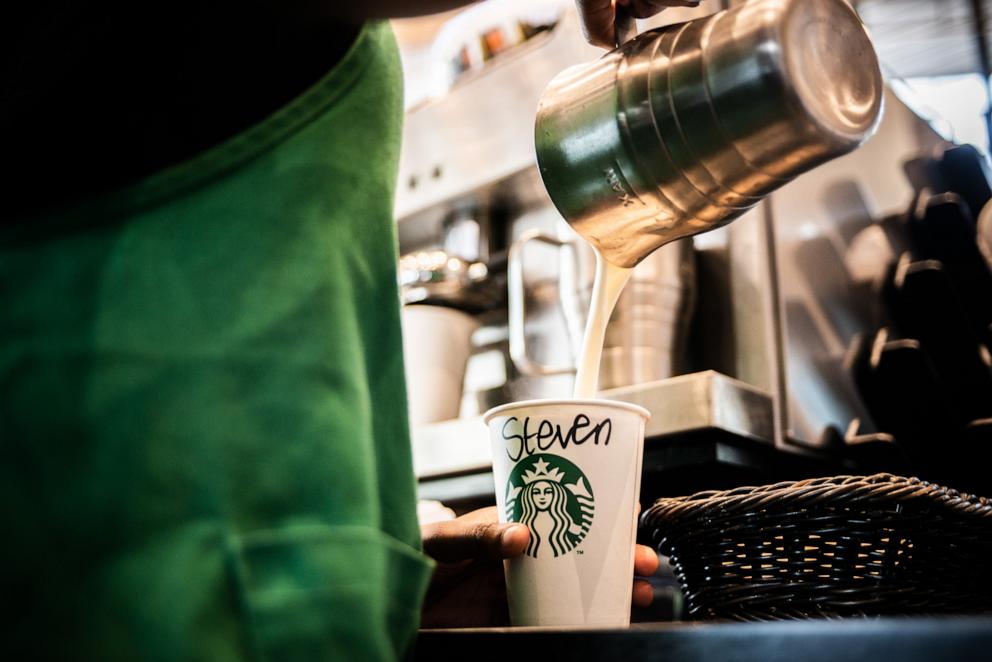 PHOTO: In this Jan. 14, 2019 file photo, a barista pours steamed milk into a beverage cup inside a Starbucks Corp. cafe in Johannesburg.