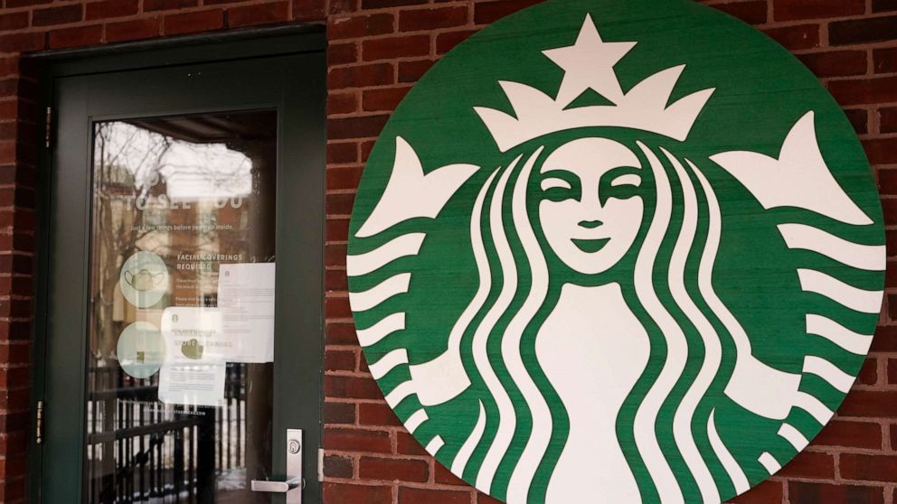 PHOTO: A Starbucks coffee company logo sign is seen at Palatine Metra train station in Palatine, Ill., Jan. 6, 2021.