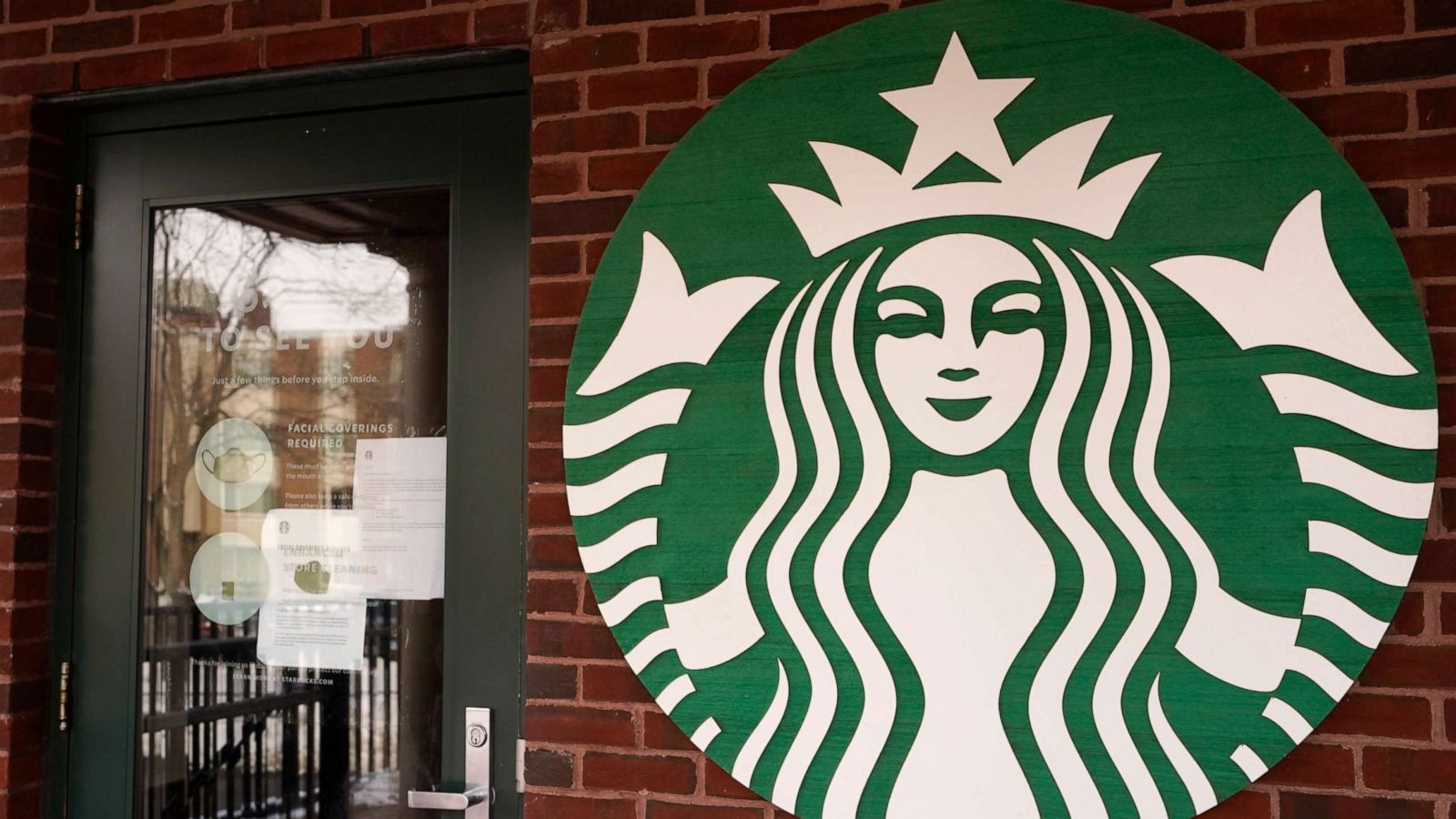 PHOTO: A Starbucks coffee company logo sign is seen at Palatine Metra train station in Palatine, Ill., Jan. 6, 2021.