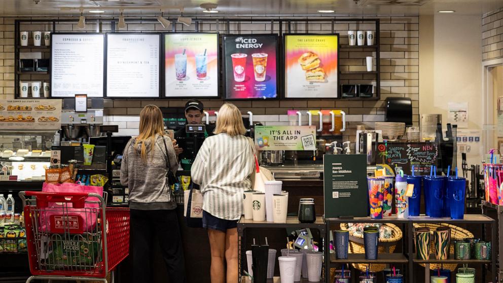 PHOTO: In this July 19. 2024, file photo, customers order at a Starbucks in Manhattan Beach, Calif.