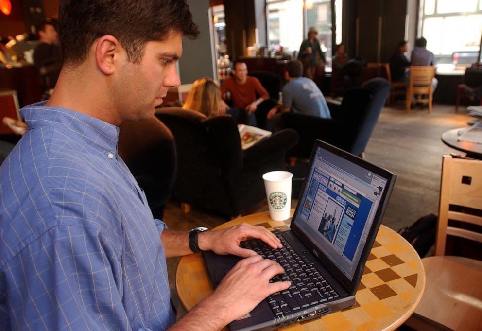 PHOTO: In this May 16, 2002, file photo, a man uses the Internet on his laptop computer at a Starbucks coffee shop in New York.