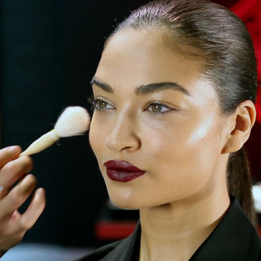 PHOTO: Patrick Ta applies Shiseido inner glow cheek powder in the color "Berry Dawn."