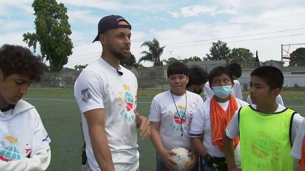 PHOTO: Steph Curry surprised middle school students at an event put on by his Eat.Play.Learn Foundation, on June 5, 2023, in Oakland, Calif.