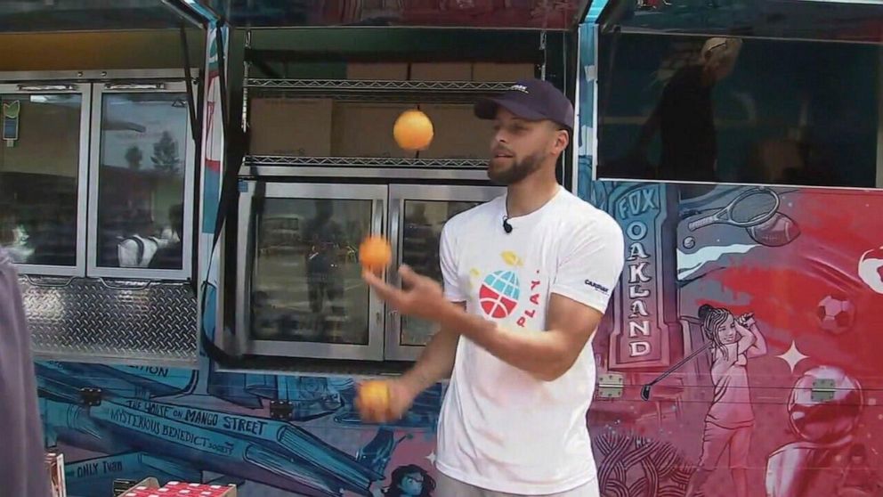 PHOTO: Steph Curry surprised middle school students at an event put on by his Eat.Play.Learn Foundation, on June 5, 2023, in Oakland, Calif.