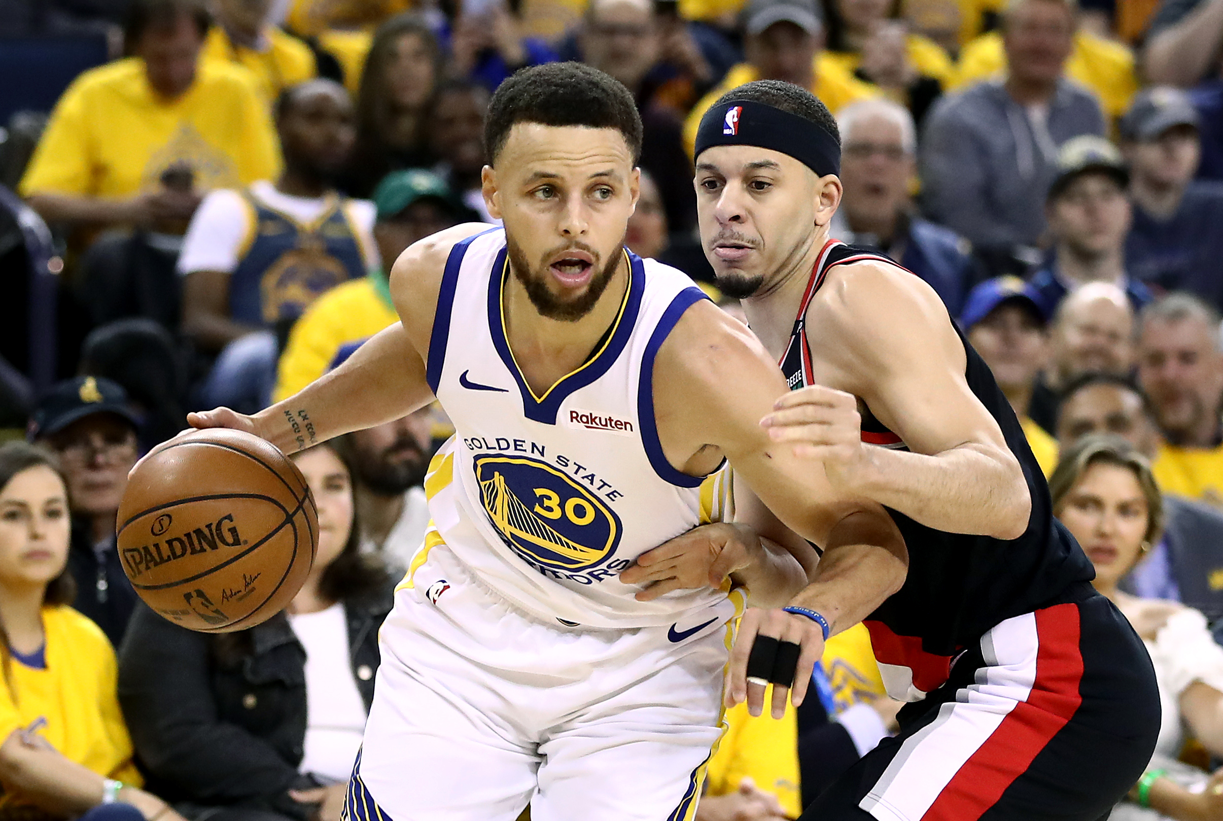 PHOTO: Seth Curry #31 of the Portland Trail Blazers defends Stephen Curry #30 of the Golden State Warriors during game one of the NBA Western Conference Finals at ORACLE Arena, May 14, 2019, in Oakland, Calif.