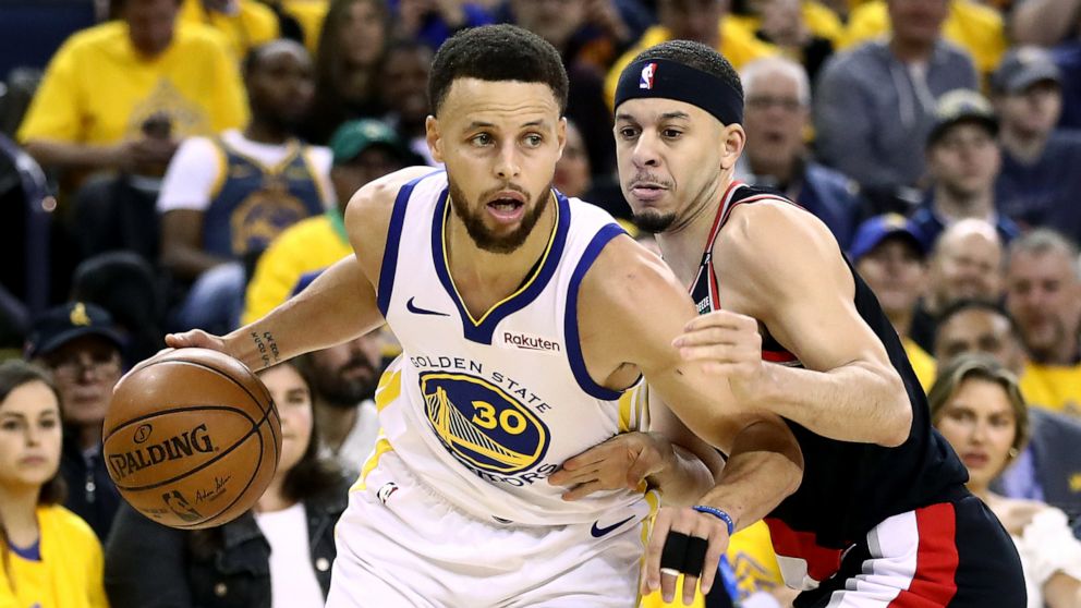 PHOTO: Seth Curry #31 of the Portland Trail Blazers defends Stephen Curry #30 of the Golden State Warriors during game one of the NBA Western Conference Finals at ORACLE Arena, May 14, 2019, in Oakland, Calif.