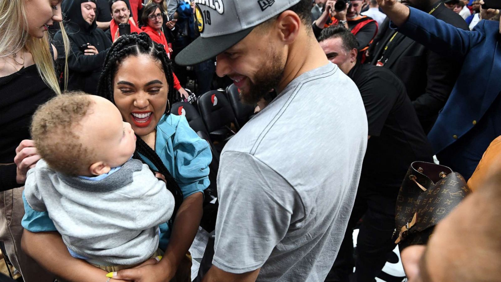 PHOTO: Stephen Curry of the Golden State Warriors greets his wife, Ayesha Curry, after advancing to the NBA Finals against the Portland Trail Blazers during Game Four of the Western Conference Finals on May 20, 2019 at the Moda Center in Portland, Ore.