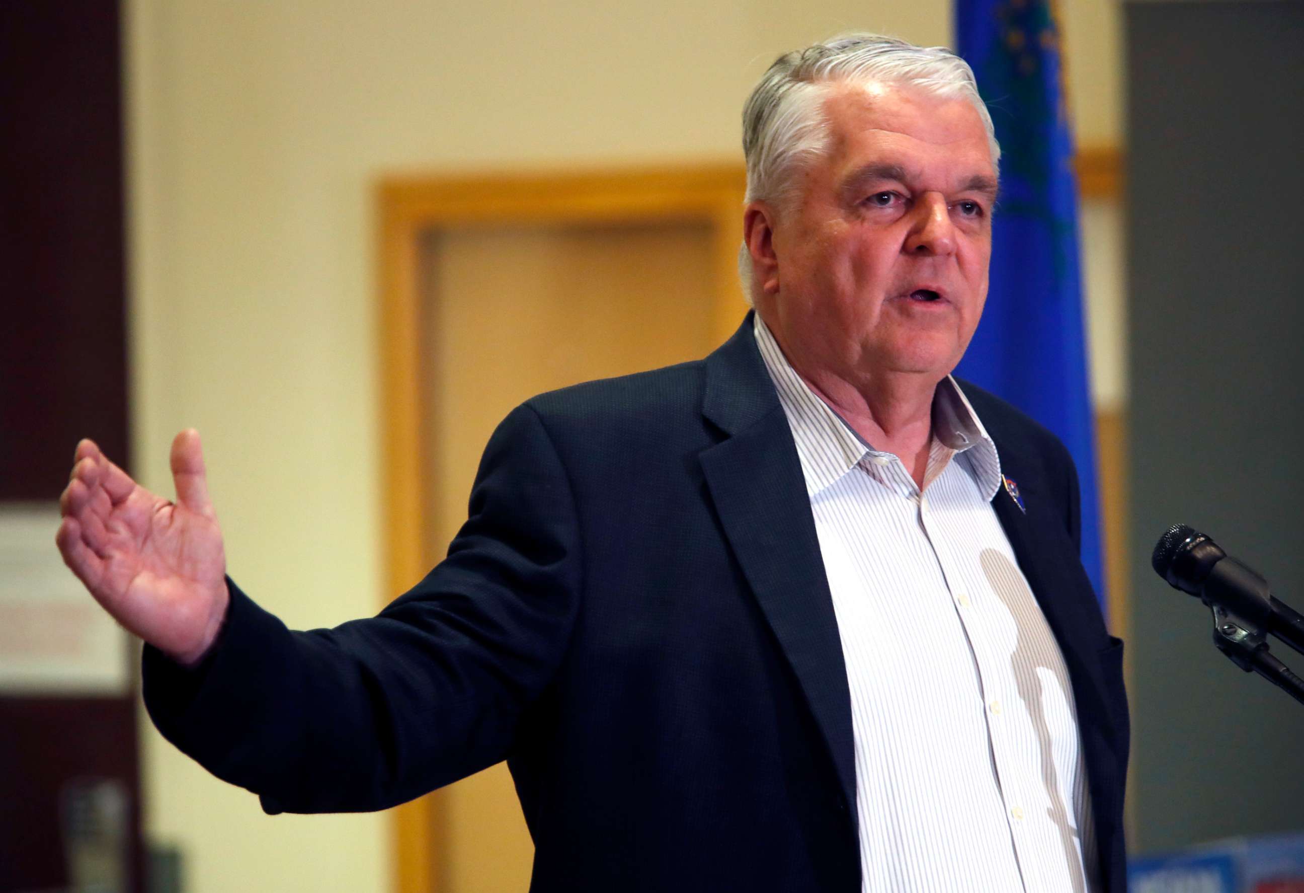 PHOTO: Nevada Gov. Steve Sisolak responds to a question during a news conference at the Sawyer State Building in Las Vegas, March 17, 2020.