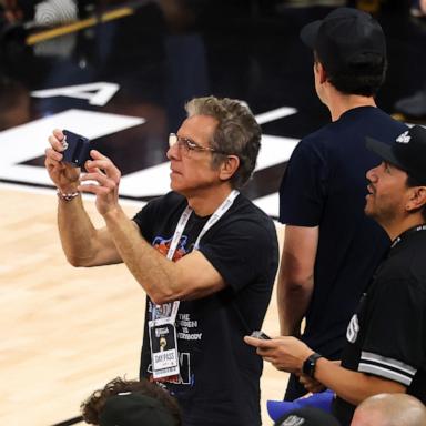 PHOTO: Ben Stiller records a video during the third quarter in Game Five of the 2026 NBA Finals between the San Antonio Spurs and the New York Knicks at Frost Bank Center, on June 13, 2026, in San Antonio, Texas. 