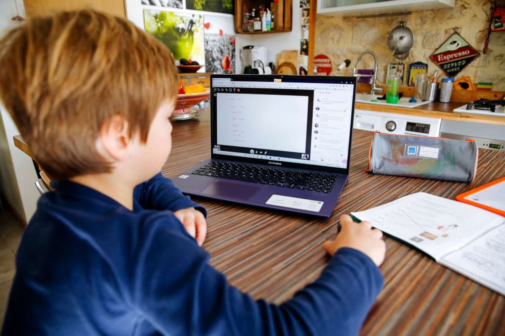 PHOTO: Stock photo of boy attending classes online. 